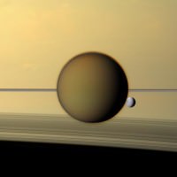 saturn, dione, and titan